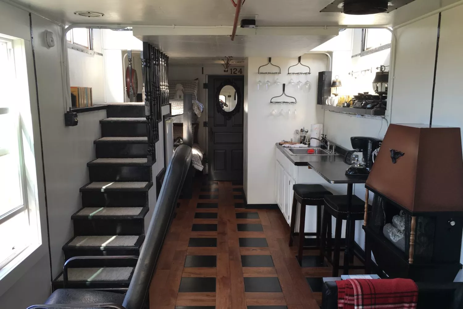 A vintage 1941 train caboose converted into a luxury Airbnb rental in Decorah.