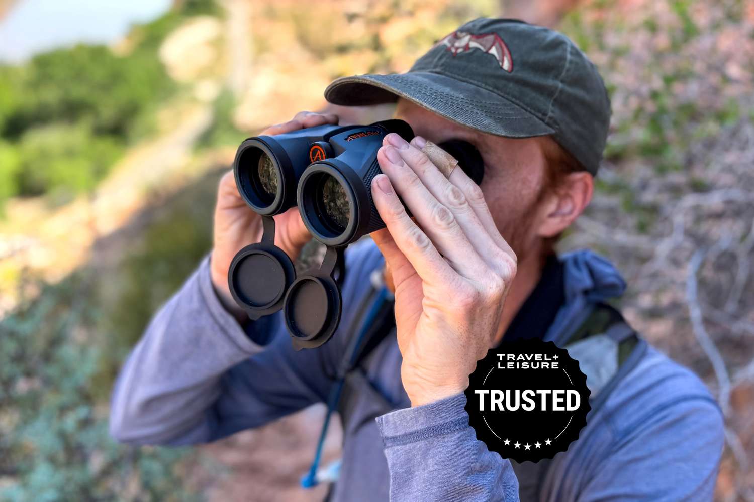 Close-up of waterproof bird watching binoculars showcasing weather-sealed construction.