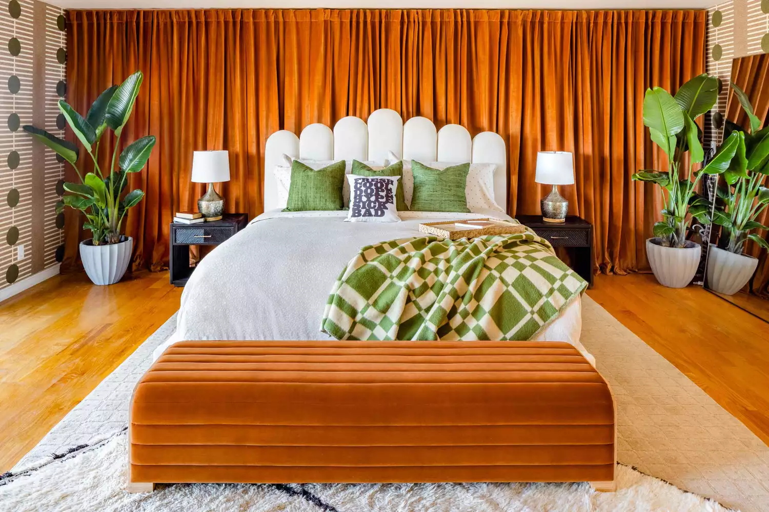 Close-up of a curated shelf or lounge area featuring Black-owned brand products and artistic decor.