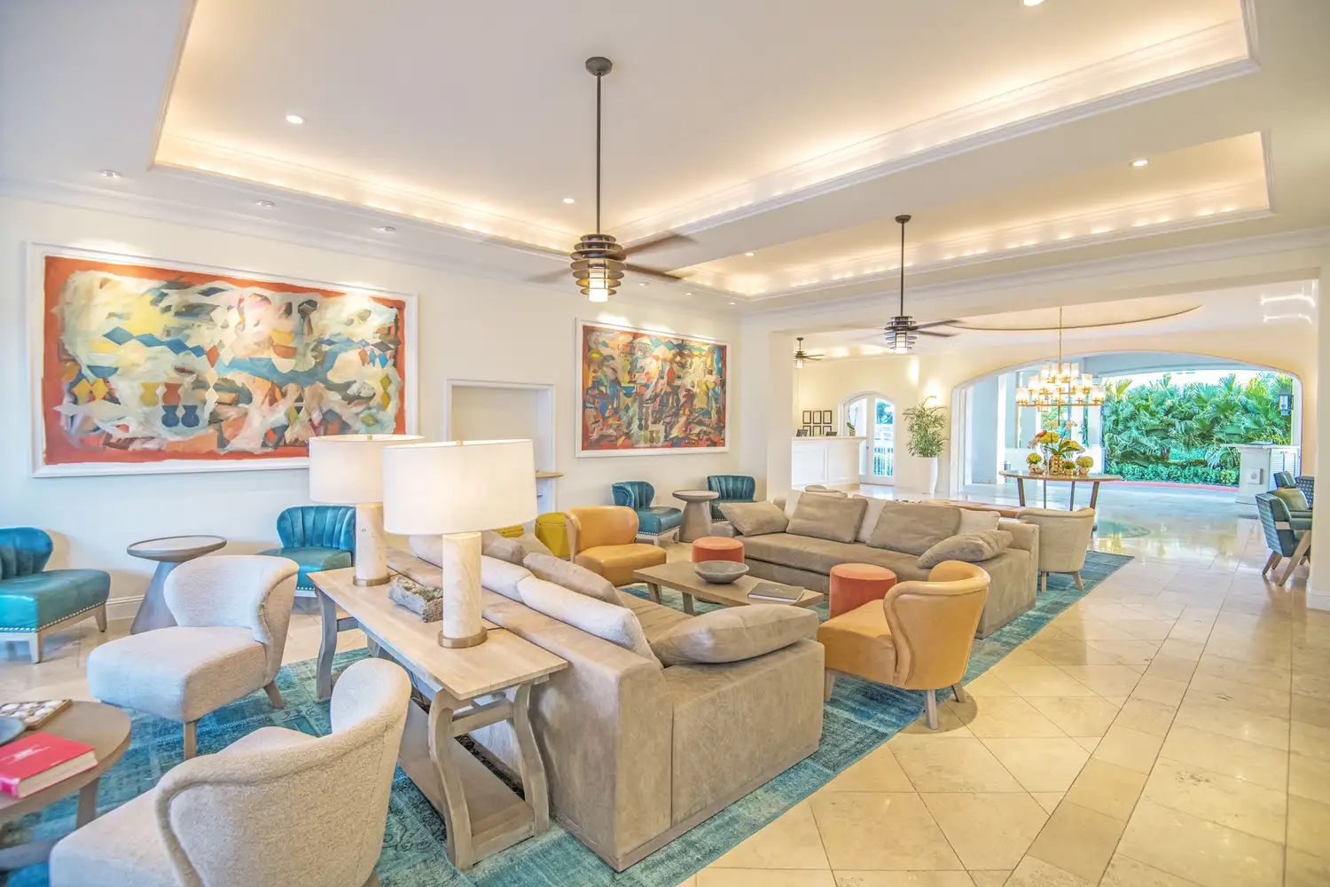 The elegant and spacious lobby of the Seven Stars Resort & Spa with modern furniture and high ceilings.