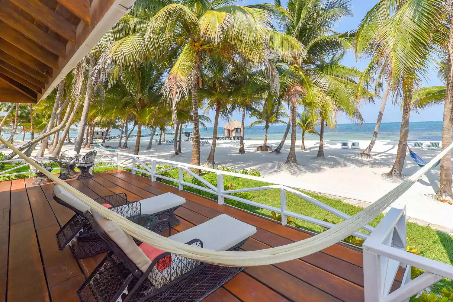 The sun-drenched beach and outdoor terrace at Victoria House Resort and Spa.