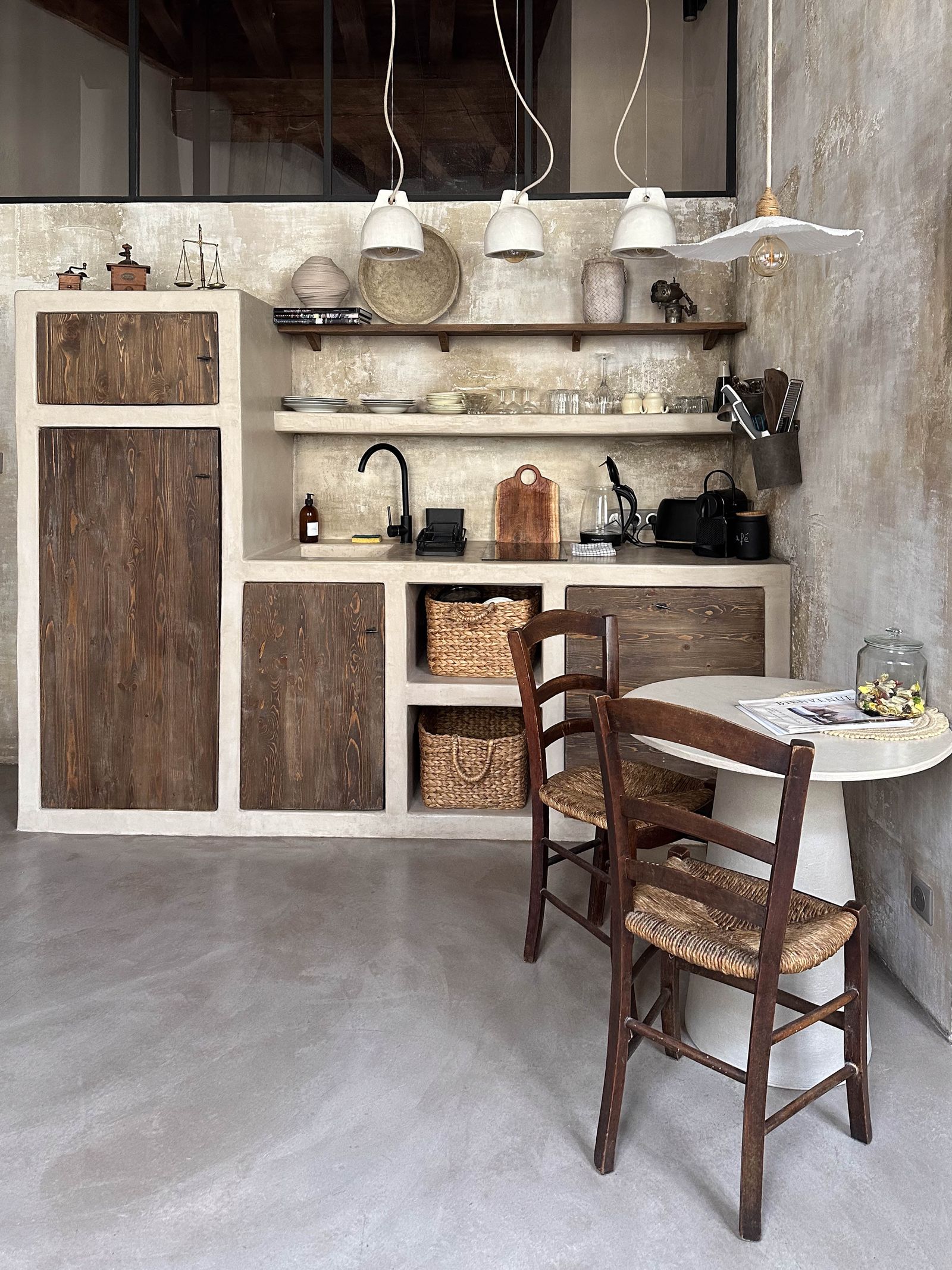 A high-end kitchen with wooden accents and gourmet accessories in a luxury vacation rental.