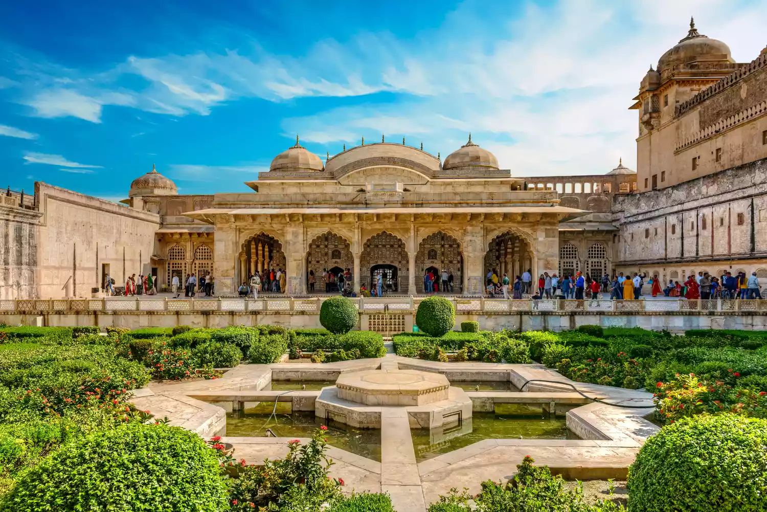 The geometric Maota Lake gardens and stone fortifications of the Amber Fort.