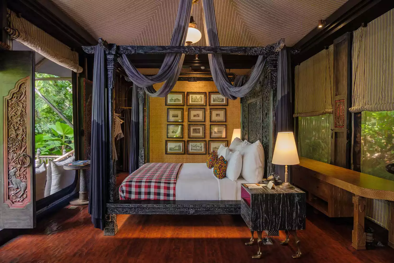 Luxury guest room interior at Capella Ubud Bali featuring traditional Balinese design