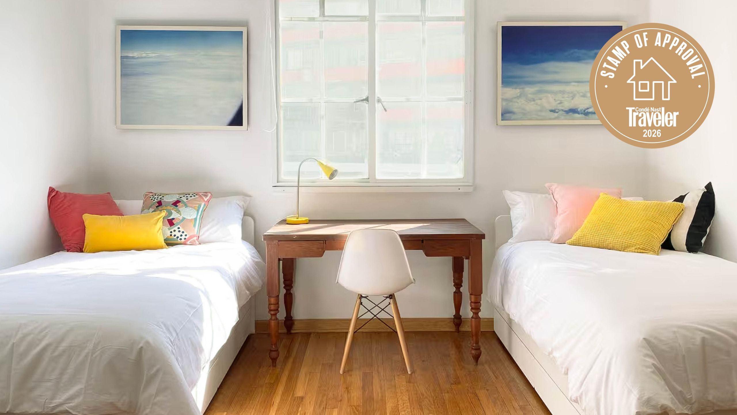 A well-lit wooden desk with a lamp and chair, set up for a digital nomad in a Roma Mexico City rental.