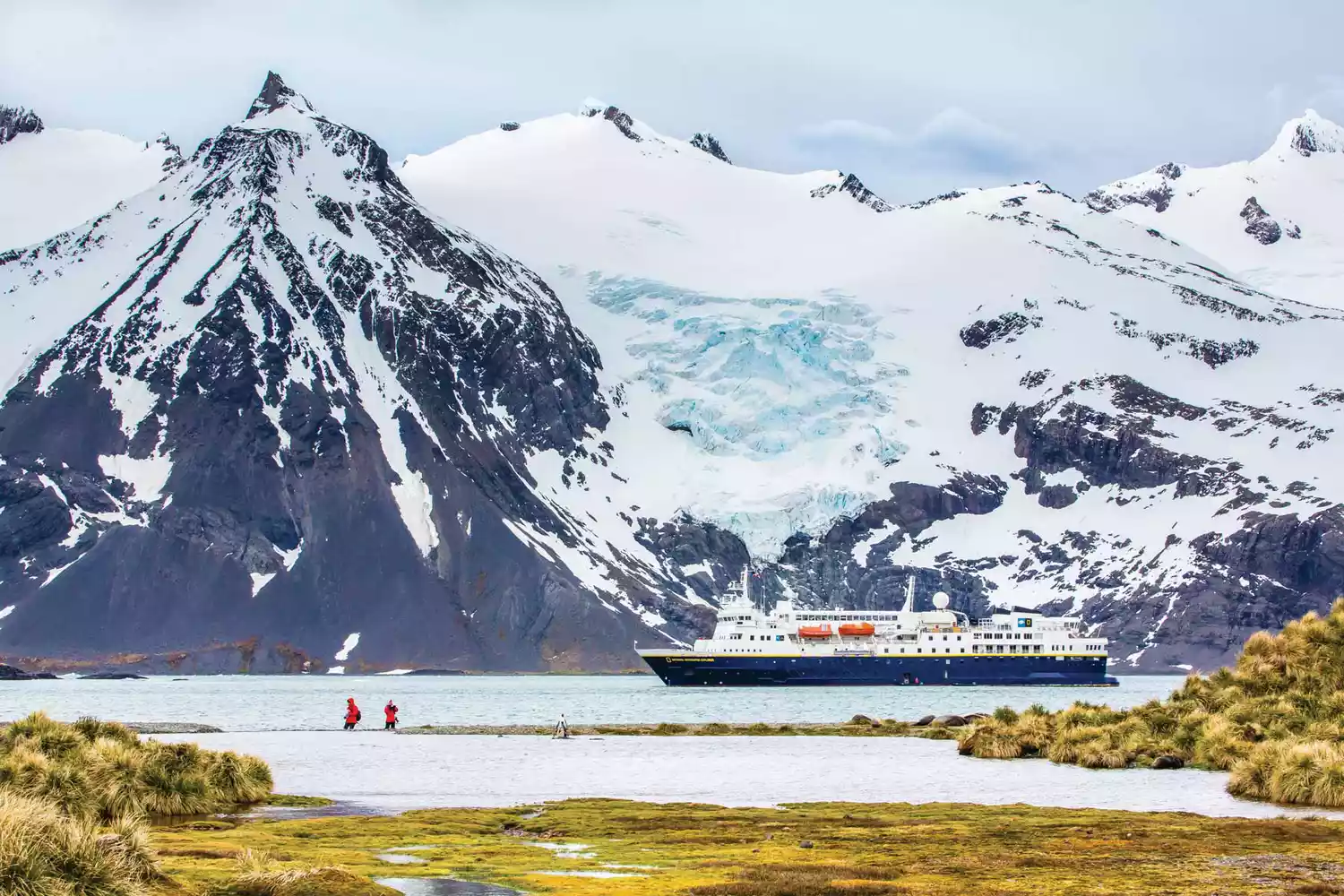 The Lindblad Expeditions National Geographic Explorer ship in an icy polar environment.