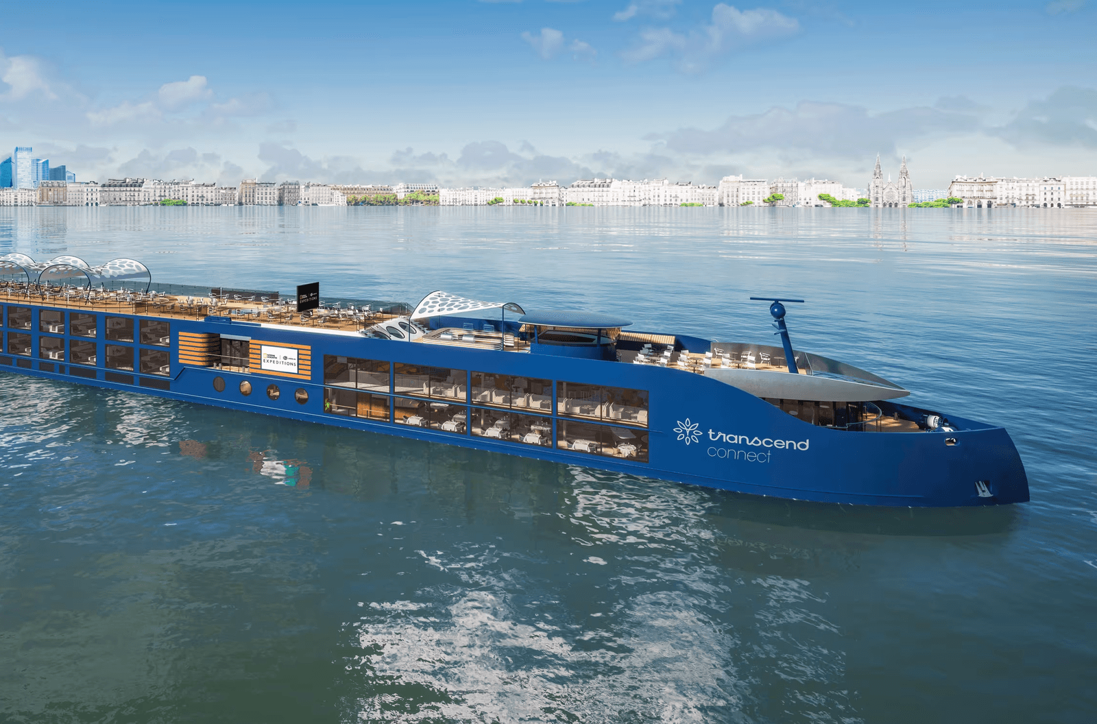A sleek, boutique-style river cruise ship traveling on a quiet river.