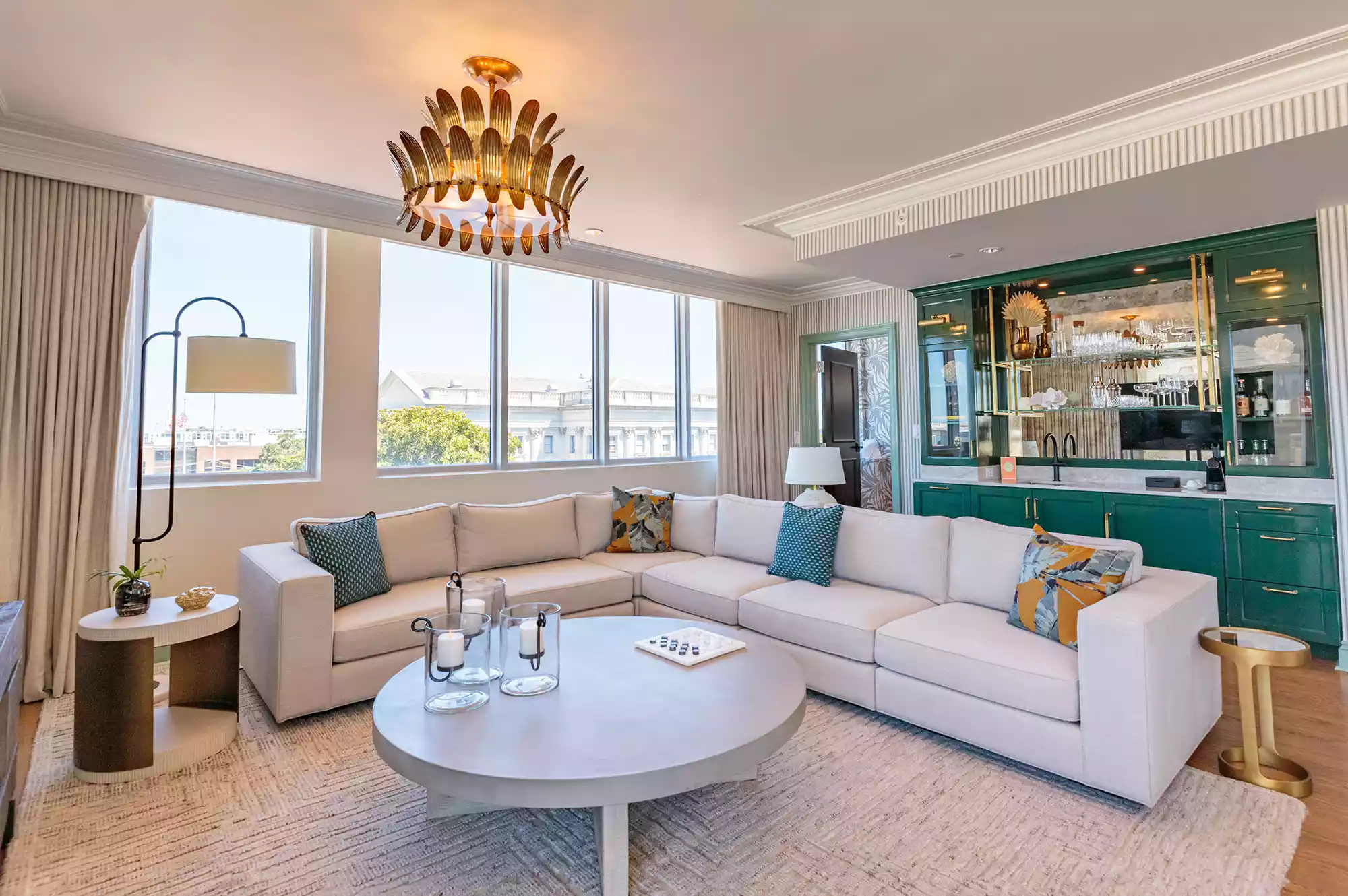 Spacious luxury penthouse suite with high-end furnishings and expansive layout.