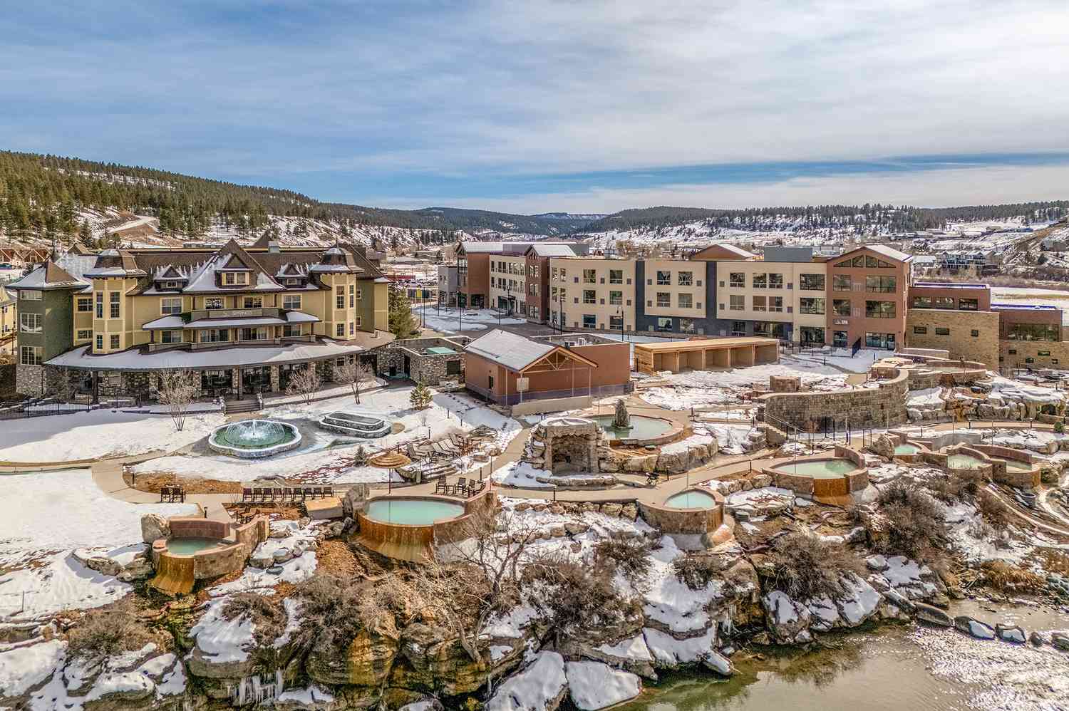 The main entrance or iconic feature of The Springs Resort Pagosa Springs showing the luxury wellness infrastructure.