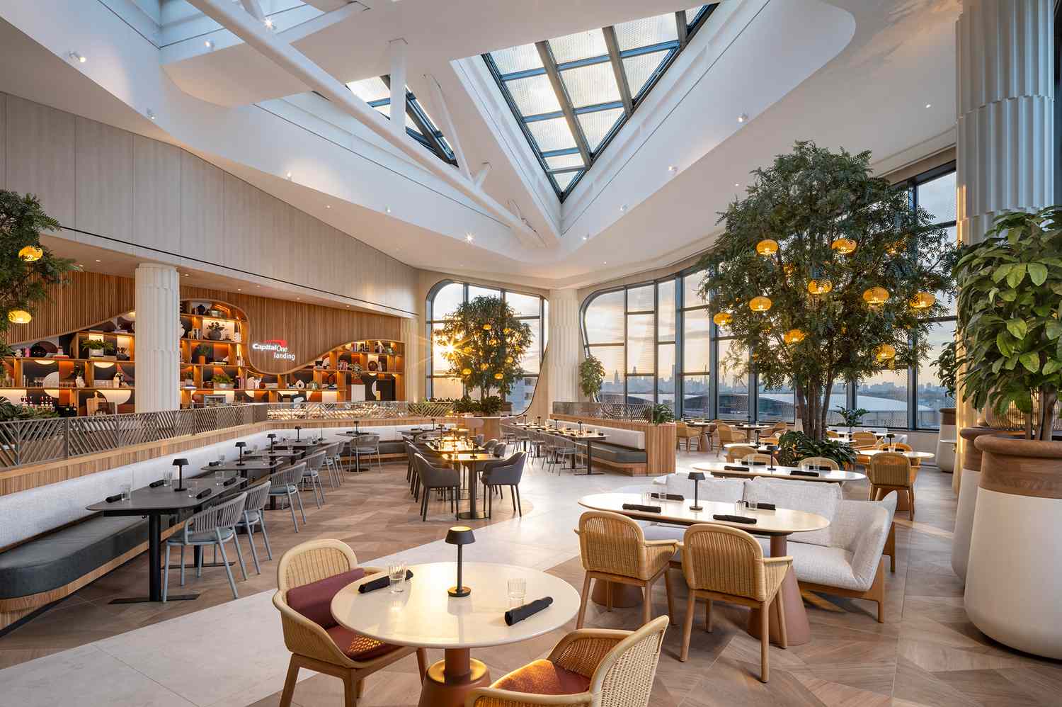 The sleek dining area and seating at Capital One Landing in LaGuardia Airport.