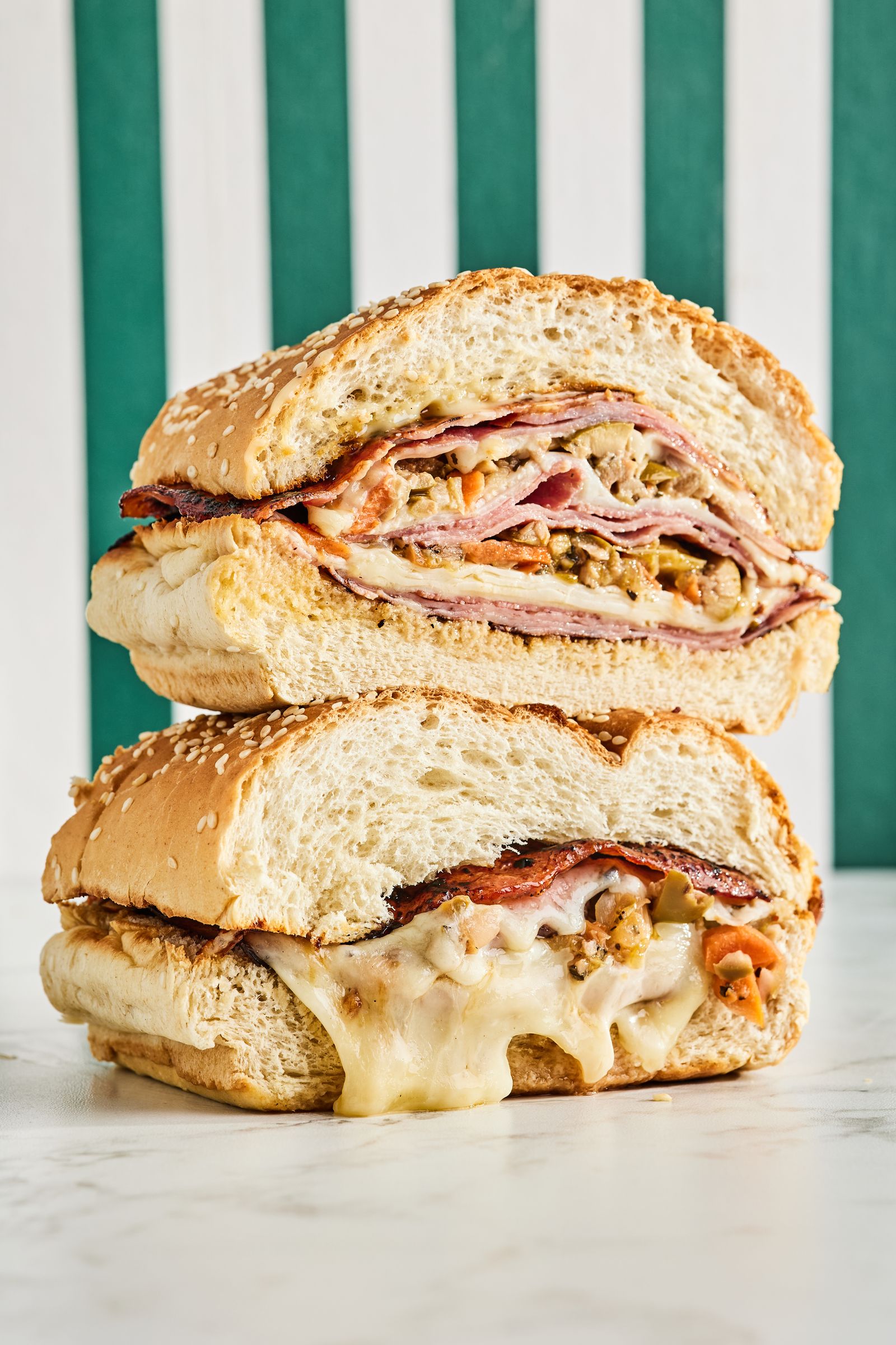 A lacy-edged smashed burger in a classic diner setting.