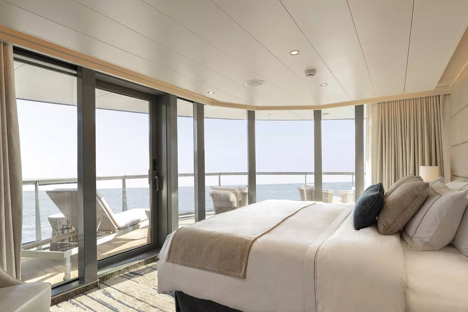 The spacious and modern Royal Suite on a Silversea Silver Origin ship.