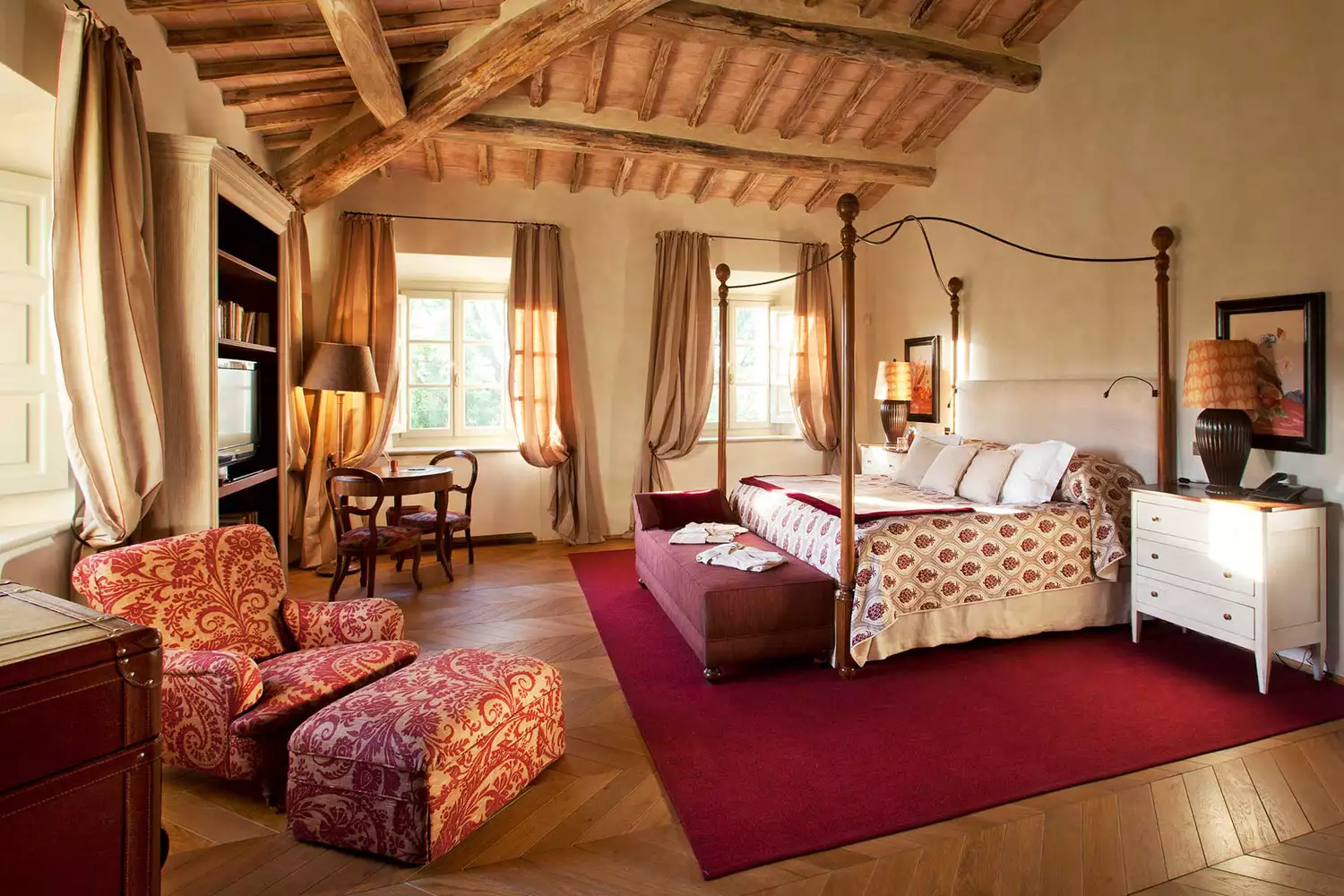 Elegantly appointed guest room at Rosewood Castiglion del Bosco in Tuscany.