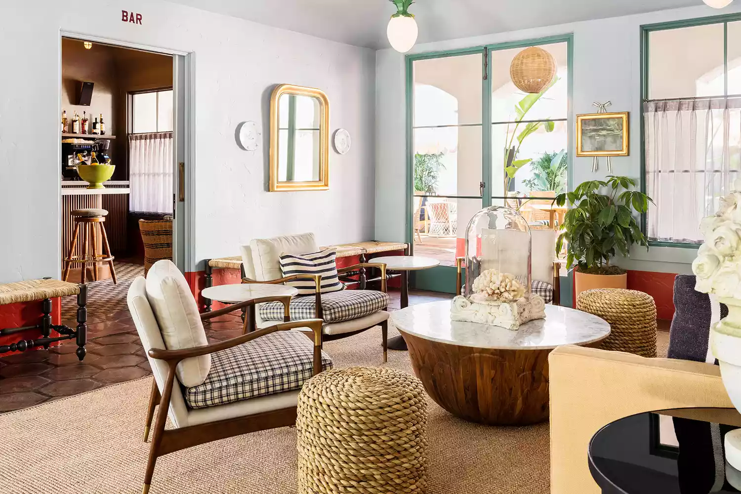 The lobby interior at Palihouse Santa Barbara with curated vintage-style furniture.