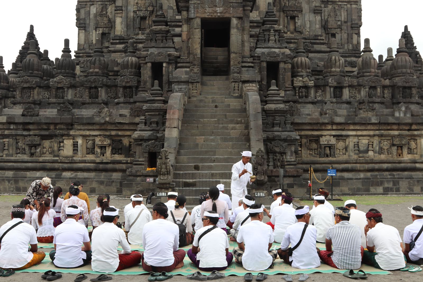 Close-up of traditional footwear and attire suitable for temple visits.