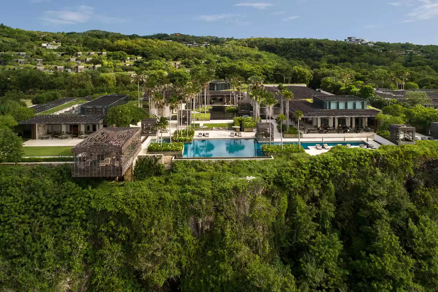 Aerial view of modern luxury villas at Alila Villas Uluwatu on a cliff