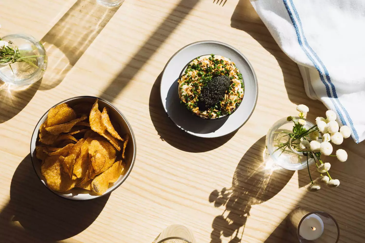 Close-up of elegantly plated small appetizers at Ruse featuring fresh local Maryland seafood.
