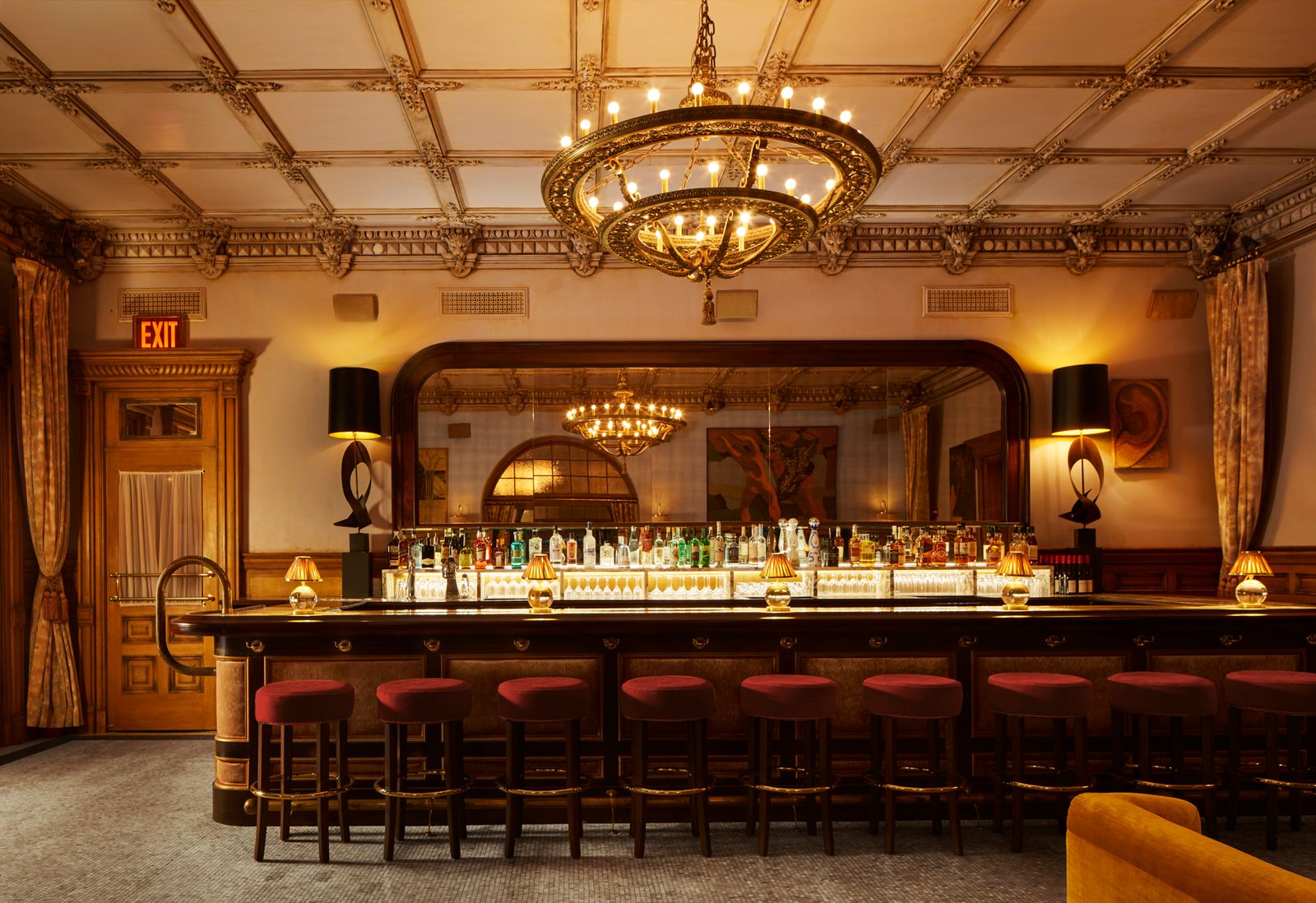 The moody and historic interior of the Hotel Chelsea lobby bar.