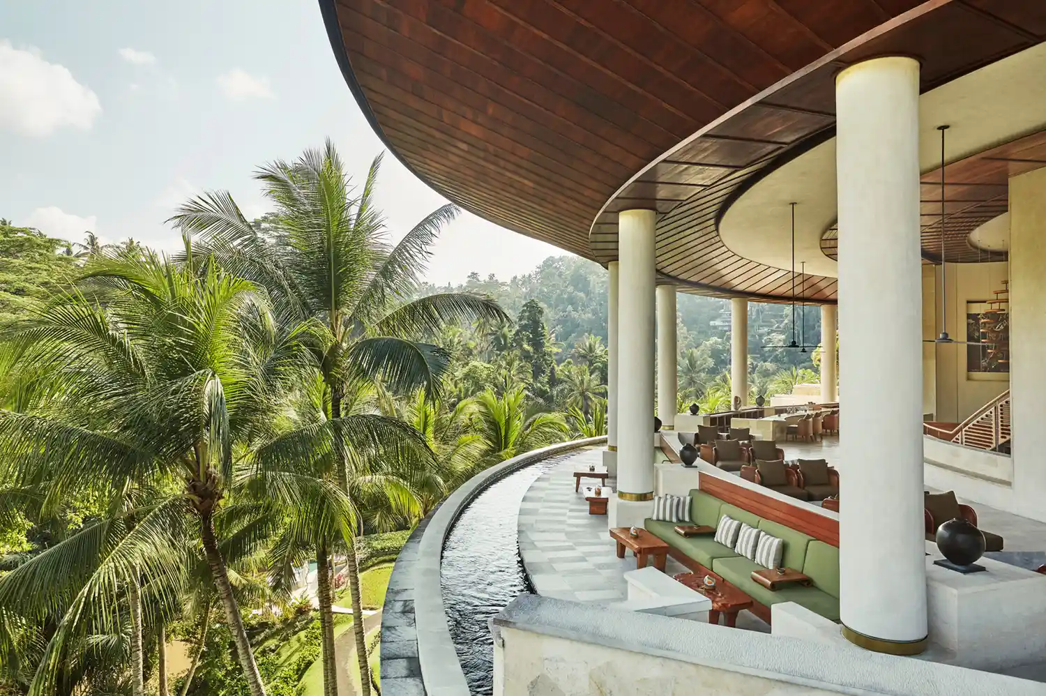 The iconic circular lotus pond and lounge area at the Four Seasons Resort Bali at Sayan.