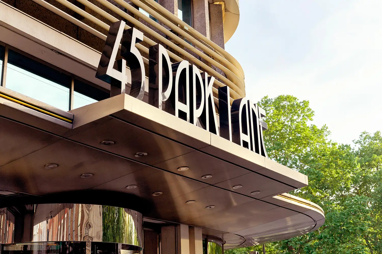 Outdoor sign of 45 Park Lane showing its Art Deco typography
