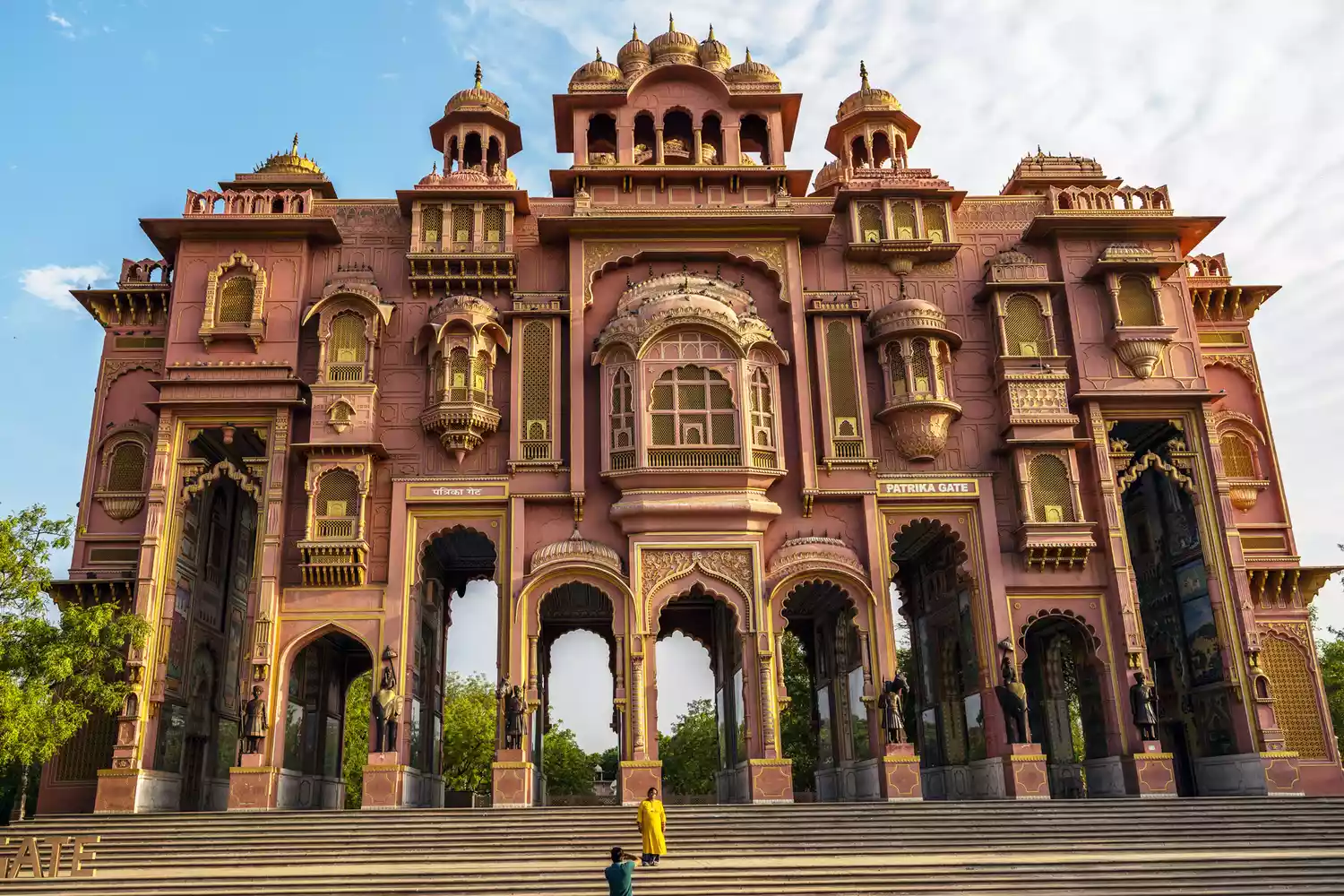The colorful and intricately painted arches of the Patrika Gate at Jawahar Circle.