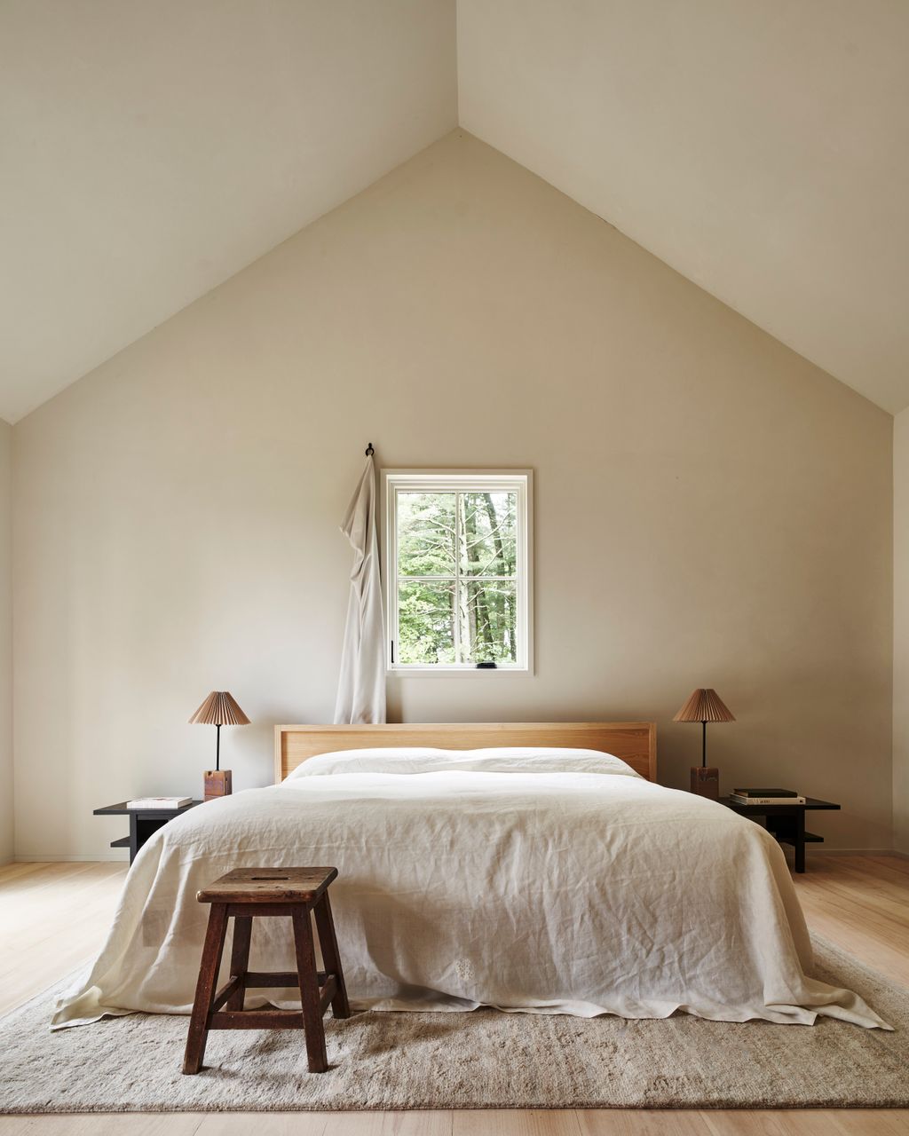 A minimalist and cozy farmhouse-style interior with warm lighting and clean design.