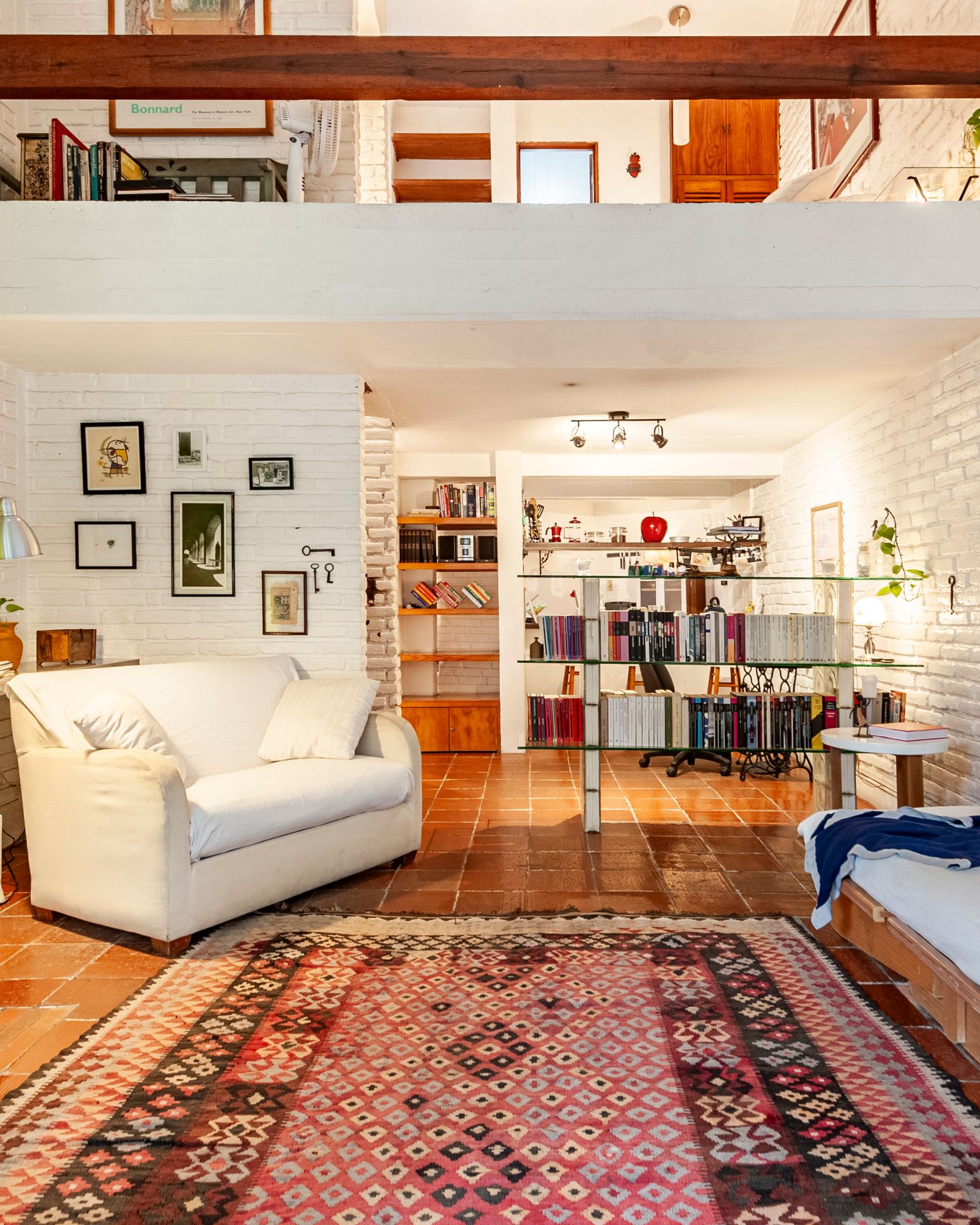 Modern loft interior with high ceilings and stylish furniture representing premium World Cup fan stays.